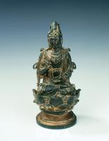 Chinese art Gilt bronze statue of bodhisattva on lotus seat, Liao dynasty, China, mid 11th century.